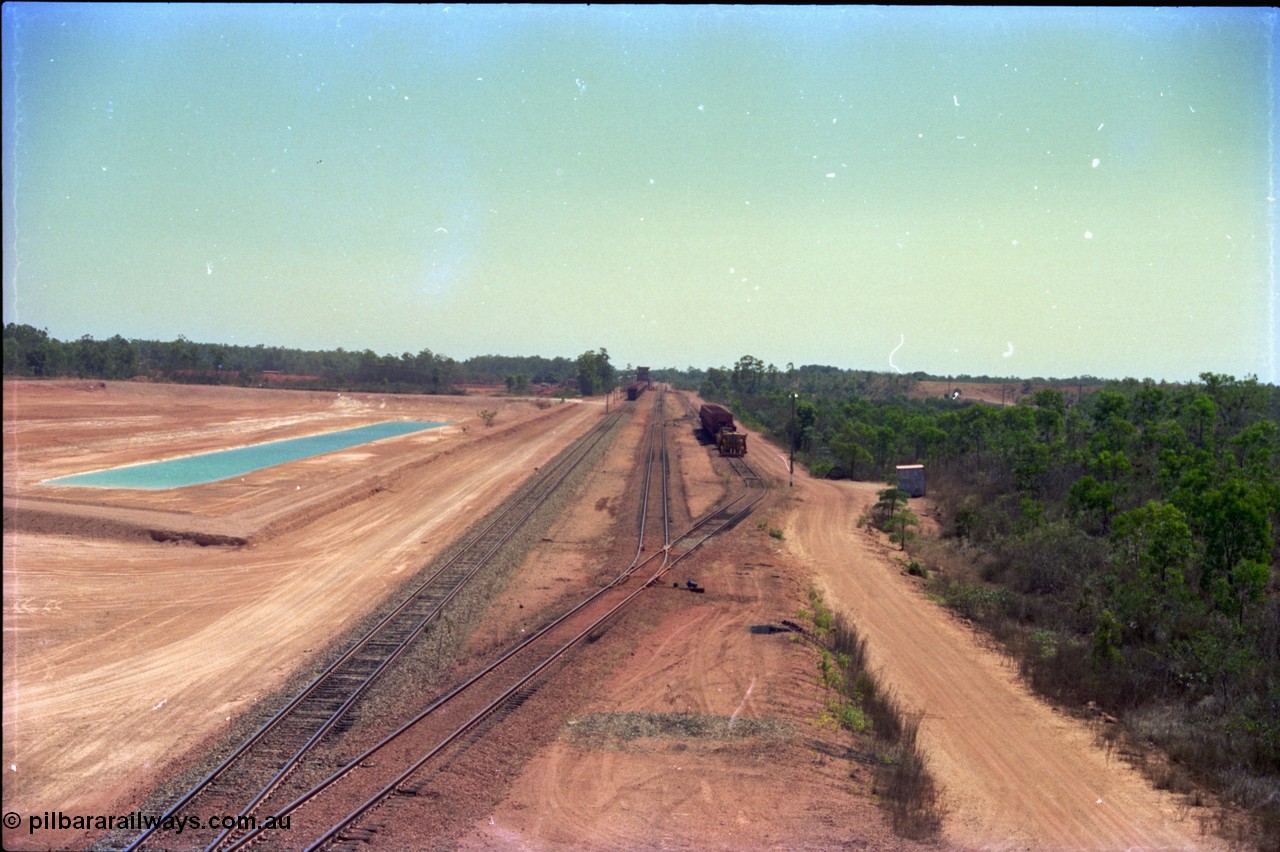 212-02
Weipa, view from the road overbridge looking towards the dump station and small yard that is Lorim Point, the dump station is in the far distance.
