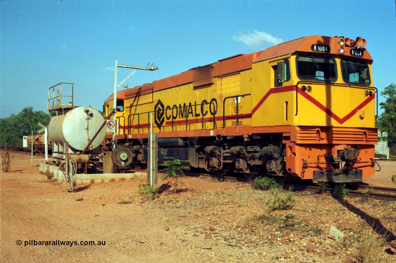 213-19
Weipa, Lorim Point fuel point, Comalco R 1004 loco Clyde Engineering built EMD model JT42C built 1990 serial 90-1277, weight 132 tonne, engine 12-710G3A, generator AR11-WBA-CA5, traction motors D87ETR, rated power 2460 kW/3300 hp. The body is similar to a V/Line N class while the components are the same as the Australian National AN class. Originally built for Goldsworthy Mining as GML 10 for use at their Western Australian iron ore railway and locally known as Cinderella. Purchased by Comalco in 1994 following the takeover of Goldsworthy by BHP.
Keywords: R1004;Clyde-Engineering-Kelso-NSW;EMD;JT26C;90-1277;Comalco;GML10;Cinderella;GML-class;