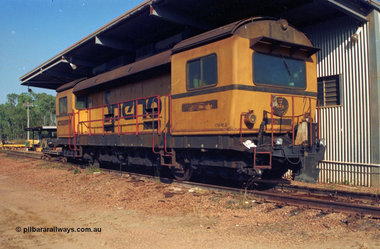 213-30
Weipa, Lorim Point railway workshops track maintenance compound, Speno rail grinder model RR 28E, a twenty eight wheel grinder, this unit is very likely to have been originally purchased by Mt Newman Mining and used in the Pilbara in the 1970s. Even a remote railway requires a grinder! September 1995.
Keywords: Speno;RR-28E;track-machine