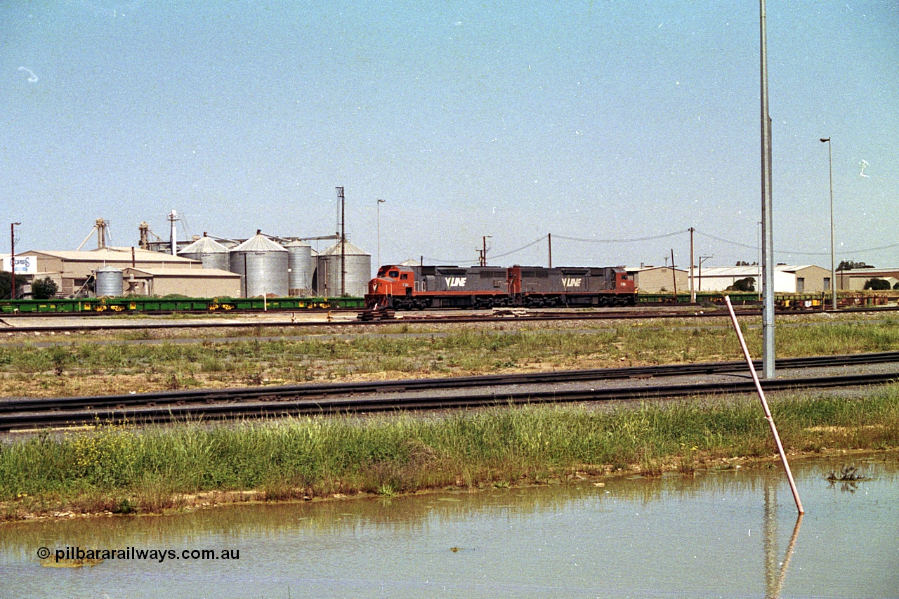 215-17
Dry Creek Yard, a pair of broad gauge V/Line C class locomotives rest between jobs.
