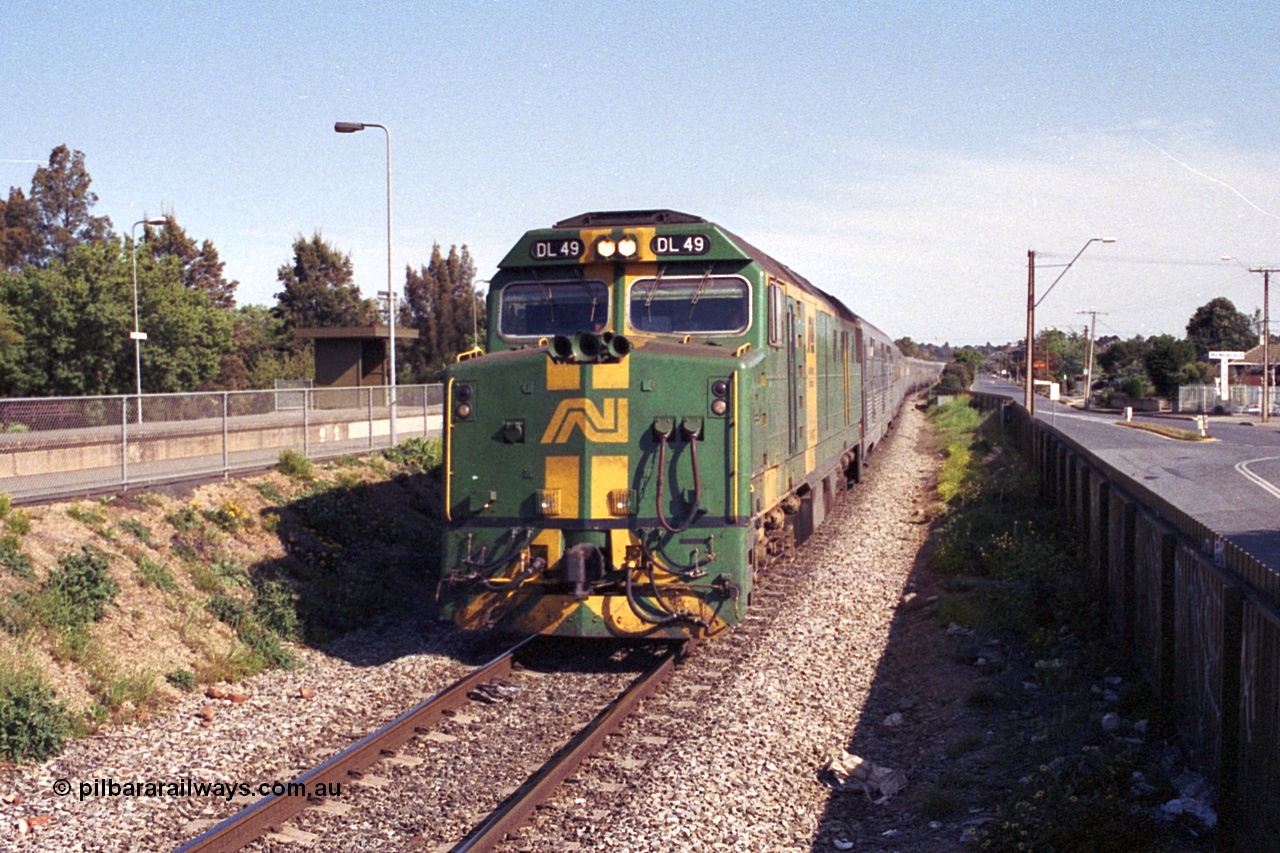 215-36
Dudley Park, the Indian Pacific passenger train on approach with power from an AN livered DL class DL 49 Clyde Engineering EMD model AT42C serial 89-1268.
Keywords: DL-class;DL49;Clyde-Engineering-Kelso-NSW;EMD;AT42C;89-1268;
