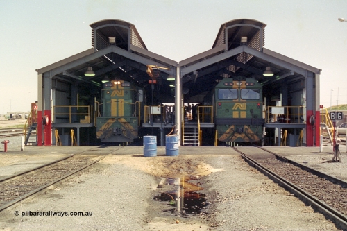 215-22
Dry Creek Motive Power Centre, fuel point shed, standard gauge road on the left with 600 class 606 AE Goodwin ALCo model DL541 serial G6015-5 and dual gauge road on the left with BL class BL 32 Clyde Engineering EMD model JT26C-2SS serial 83-1016.
Keywords: 600-class;606;AE-Goodwin;ALCo;DL541;G6015-5;