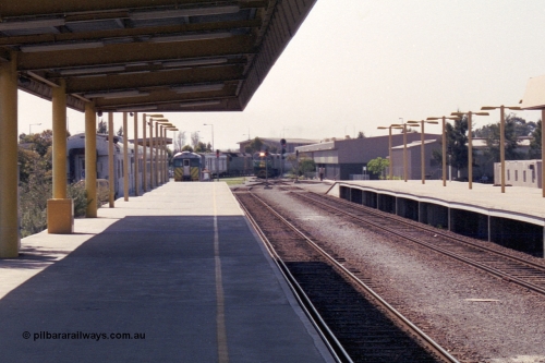 215-27
Keswick, the Australian National Adelaide interstate passenger terminal with the Indian Pacific arriving behind an EL class, DL class in the distance.
