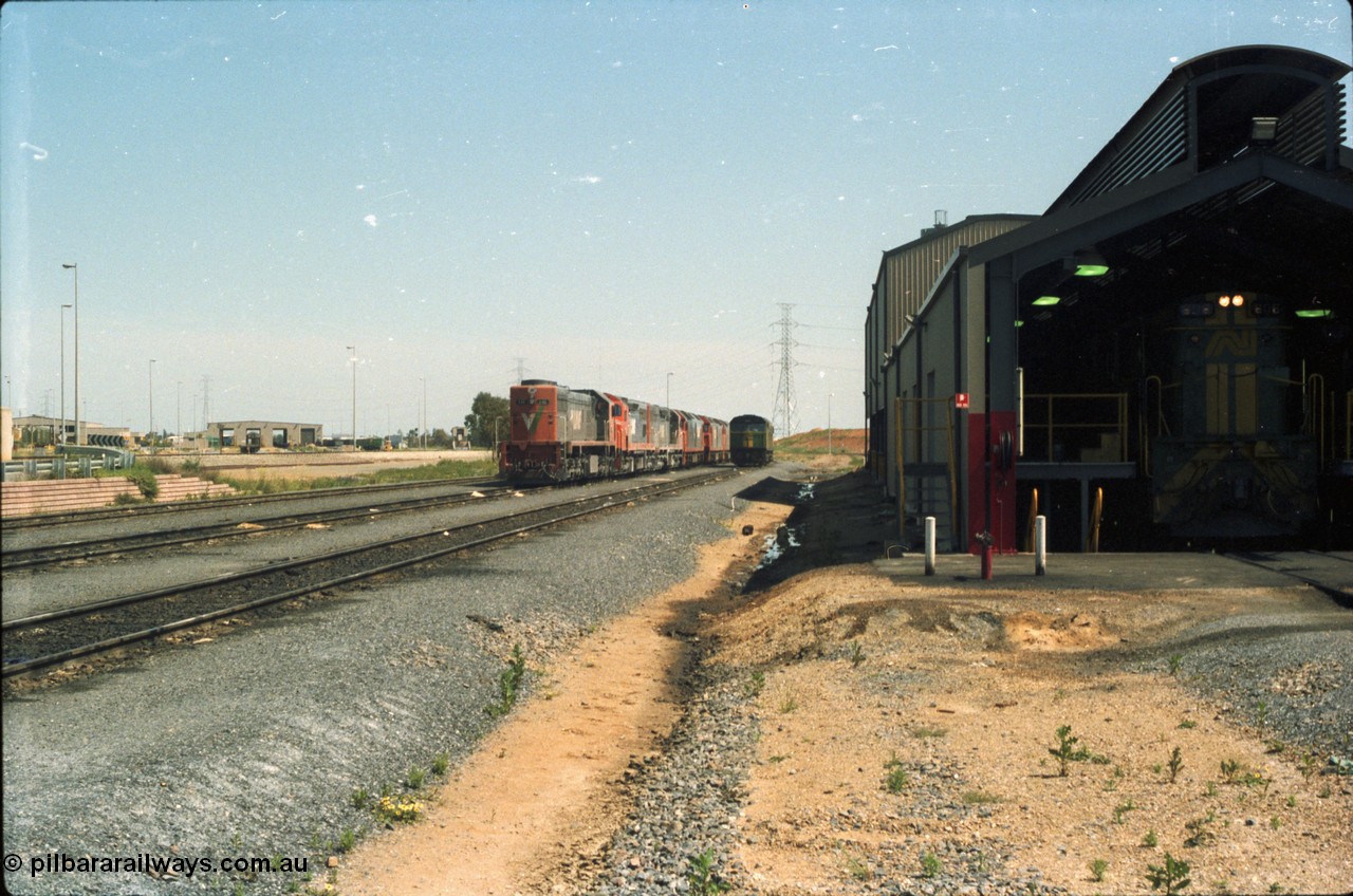216-17
Dry Creek Motive Power Centre, hosts a number of broad gauge V/Line locomotives as they rest before running the overnight trains back to Melbourne, in the view are members of the X, C and G class next to an AN 700 class.
