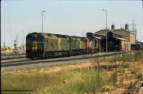 216-10
Dry Creek Motive Power Centre, fuel point roads, AN BL class BL 31 Clyde Engineering EMD model JT26C-2SS serial 83-1015 with 700 class 704 AE Goodwin ALCo model DL500G serial G6059-2 rest between jobs with V/Line broad gauge N class behind them.
Keywords: BL-class;BL31;Clyde-Engineering-Rosewater-SA;EMD;JT26C-2SS;83-1015;