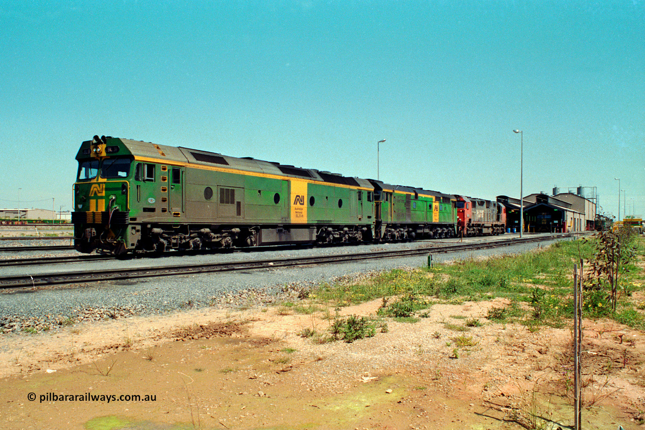 217-21
Dry Creek Motive Power Centre, fuel point roads, AN BL class BL 31 Clyde Engineering EMD model JT26C-2SS serial 83-1015 with 700 class 704 AE Goodwin ALCo model DL500G serial G6059-2 rest between jobs with V/Line broad gauge N class behind them.
Keywords: BL-class;BL31;Clyde-Engineering-Rosewater-SA;EMD;JT26C-2SS;83-1015;