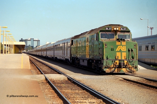 217-05
Keswick Passenger Terminal, Australian National DL class locomotive DL 37 Clyde Engineering EMD model AT42C serial 88-1245 on the pointy end of 'The Ghan' as departure time approaches.
Keywords: DL-class;DL37;Clyde-Engineering-Kelso-NSW;EMD;AT42C;88-1245;