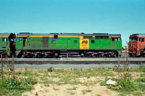 217-24
Dry Creek Motive Power Centre, fuel point roads, AN locomotive of the 700 class 704 AE Goodwin ALCo model DL500G serial G6059-2, side view.
Keywords: 700-class;704;AE-Goodwin;ALCo;DL500G;G6059-2;