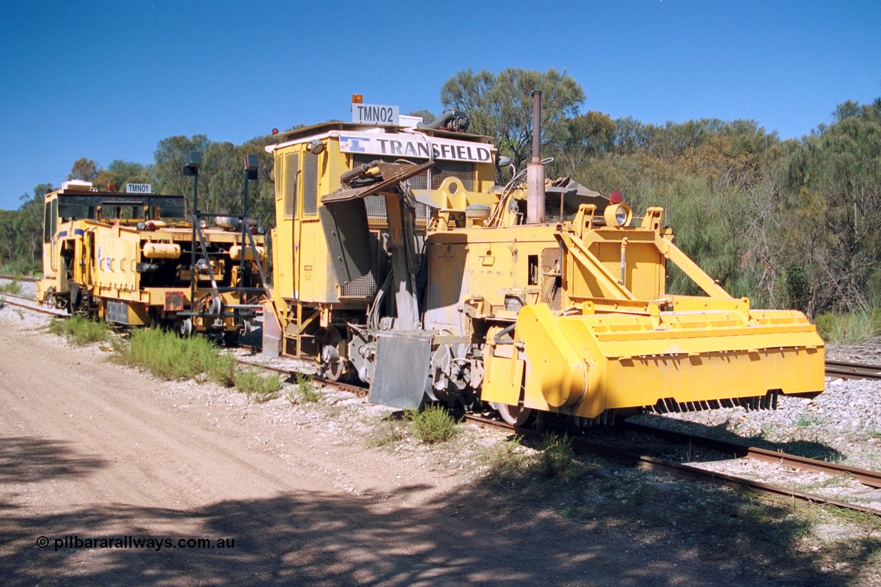244-17
Coomunga, on the siding, two Transfield track machines, TMN 02, a ballast regulator and TMN 01 a track tamper. 6th April, 2003.
Keywords: track-machine;