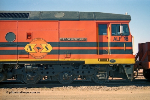 244-10
Port Augusta yard, cab side shot of Morrison Knudsen rebuild unit ALF 18 City of Port Pirie, model JT26C-2M serial 94-AN-018 in Australian Southern livery, originally AL class AL 21.
Keywords: ALF-class;ALF18;MKA;EMD;JT26C-2M;94-AN-018;rebuild;AL-class;AL21;Clyde-Engineering;EMD;JT26C;76-837;