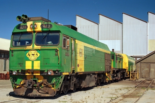 244-20
Port Lincoln loco workshops, still wearing the former owners AN livery, Australian Southern NJ class leader NJ 1 'Ben Chifley' Clyde Engineering EMD model JL22C serial 71-728, in multiple unit consist, roster shot. 6th April, 2003.
Keywords: NJ-class;NJ1;Clyde-Engineering-Granville-NSW;EMD;JL22C;71-728;