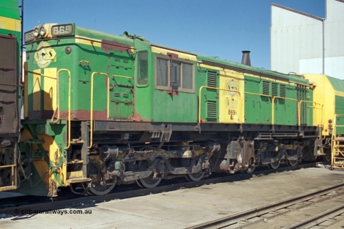 244-23
Port Lincoln loco workshops, still wearing the former owners AN livery, Australian Southern 830 class 869 AE Goodwin ALCo model DL531 serial G6016-05, sandwiched between two NJ class units. 6th April, 2003.
Keywords: 830-class;869;AE-Goodwin;ALCo;DL531;G6016-5;