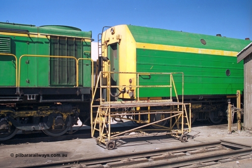 244-25
Port Lincoln loco workshops, still wearing the former owners AN livery, Australian Southern 830 class 869 AE Goodwin ALCo model DL531 serial G6016-05 coupled to NJ class NJ 4 Clyde Engineering EMD model JL22C serial 71-731. April 6, 2003.
Keywords: 830-class;869;AE-Goodwin;ALCo;DL531;G6016-5;
