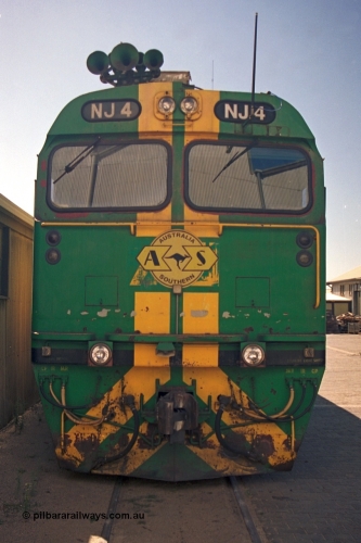 244-27
Port Lincoln loco workshops, still wearing the former owners AN livery, Australian Southern NJ class NJ 4 Clyde Engineering EMD model JL22C serial 71-731, cab front view. April 6, 2003.
Keywords: NJ-class;NJ4;Clyde-Engineering-Granville-NSW;EMD;JL22C;71-731;