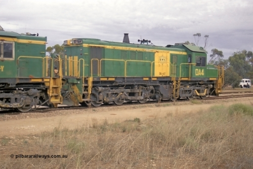 245-13
Wudinna, empty grain train behind a trio of former Australian National locomotives with rebuilt former AE Goodwin ALCo model DL531 830 class ex 839, serial 83730, rebuilt by Port Augusta Workshops to DA class, DA 4 leading two AE Goodwin ALCo model DL531 830 class units 842, serial 84140 and 851 serial 84137, 851 having been on the Eyre Peninsula since delivered in 1962, to shunt off empty waggons into the grain siding. April 7, 2003.
Keywords: DA-class;DA4;83730;Port-Augusta-WS;ALCo;DL531G/1;830-class;839;rebuild;