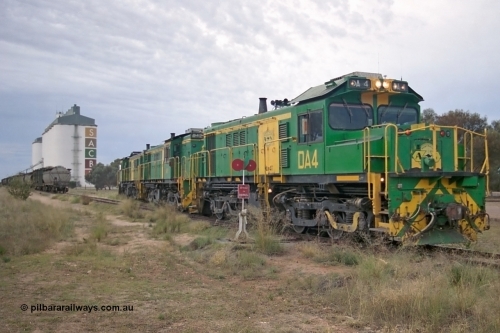 245-21
Wudinna, empty grain train locos shunt back towards the mainline having dropped waggons in the siding, a trio of former Australian National Co-Co locomotives with rebuilt former AE Goodwin ALCo model DL531 830 class ex 839, serial no. 83730, rebuilt by Port Augusta Workshops to DA class, DA 4 leading two AE Goodwin ALCo model DL531 830 class units 842, serial no. 84140 and 851 serial no. 84137, 851 having been on the Eyre Peninsula since delivered in 1962. April 7, 2003.
Keywords: DA-class;DA4;83730;Port-Augusta-WS;ALCo;DL531G/1;830-class;839;rebuild;