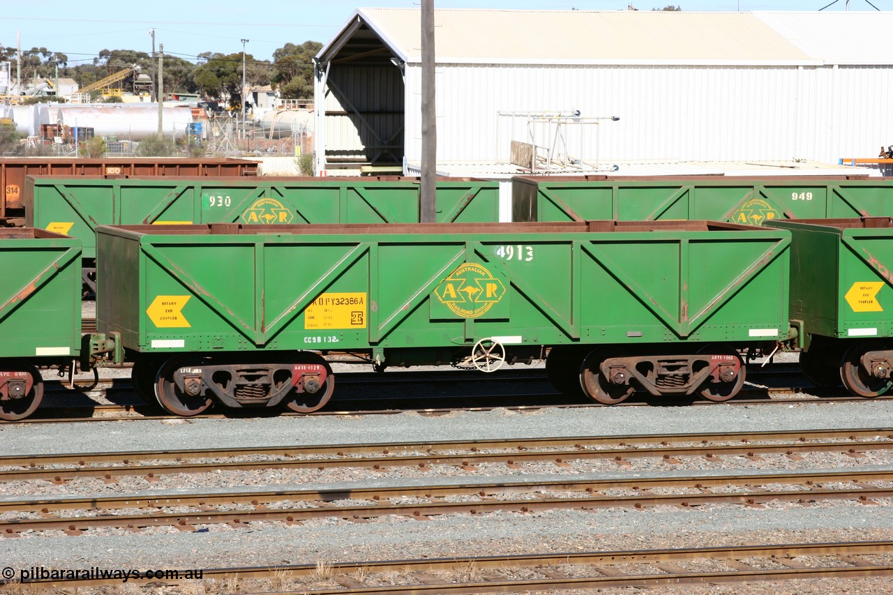 060528 4430
West Kalgoorlie, AOPY 32386 with fleet number 4913, the 4 being a recent addition, one of seventy ex ANR coal waggons rebuilt from AOKF type by Bluebird Engineering SA in service with ARG on Koolyanobbing iron ore trains. They used to be three metres longer and originally built by Metropolitan Cammell Britain as GB type in 1952-55, 28th May 2006.
Keywords: AOPY-type;AOPY32386;Bluebird-Engineering-SA;Metropolitan-Cammell-Britain;GB-type;