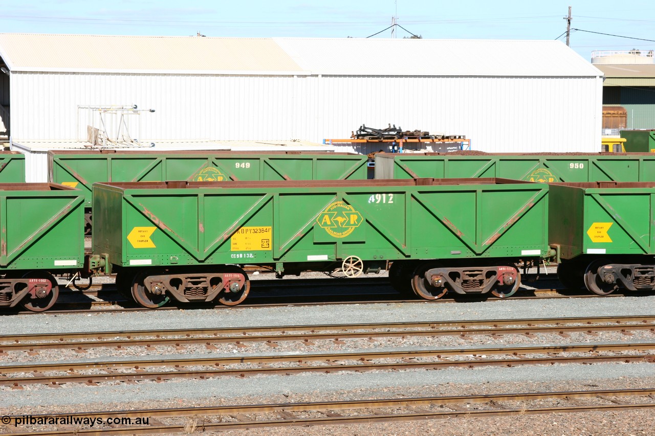 060528 4431
West Kalgoorlie, AOPY 32384 with fleet number 4912, the 4 being a recent addition due to the increasing size of the ore waggon fleet, one of seventy ex ANR coal waggons rebuilt from AOKF type by Bluebird Engineering SA in service with ARG on Koolyanobbing iron ore trains. They used to be three metres longer and originally built by Metropolitan Cammell Britain as GB type in 1952-55, 28th May 2006.
Keywords: AOPY-type;AOPY32384;Bluebird-Engineering-SA;Metropolitan-Cammell-Britain;GB-type;