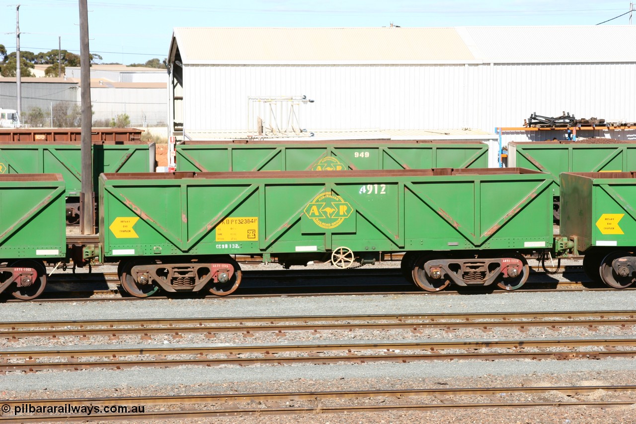 060528 4432
West Kalgoorlie, AOPY 32384 with fleet number 4912, the 4 being a recent addition due to the increasing size of the ore car fleet, one of seventy ex ANR coal waggons rebuilt from AOKF type by Bluebird Engineering SA in service with ARG on Koolyanobbing iron ore trains. They used to be three metres longer and originally built by Metropolitan Cammell Britain as GB type in 1952-55, 28th May 2006.
Keywords: AOPY-type;AOPY32384;Bluebird-Engineering-SA;Metropolitan-Cammell-Britain;GB-type;