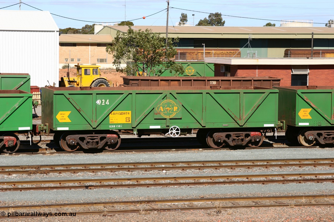 060528 4435
West Kalgoorlie, AOPY 32397, fleet number 4924, with the 4 just squeezed in, one of seventy ex ANR coal waggons rebuilt from AOKF type by Bluebird Engineering SA in service with ARG on Koolyanobbing iron ore trains. They used to be three metres longer and originally built by Metropolitan Cammell Britain as GB type in 1952-55, 28th May 2006.
Keywords: AOPY-type;AOPY32397;Bluebird-Engineering-SA;Metropolitan-Cammell-Britain;GB-type;