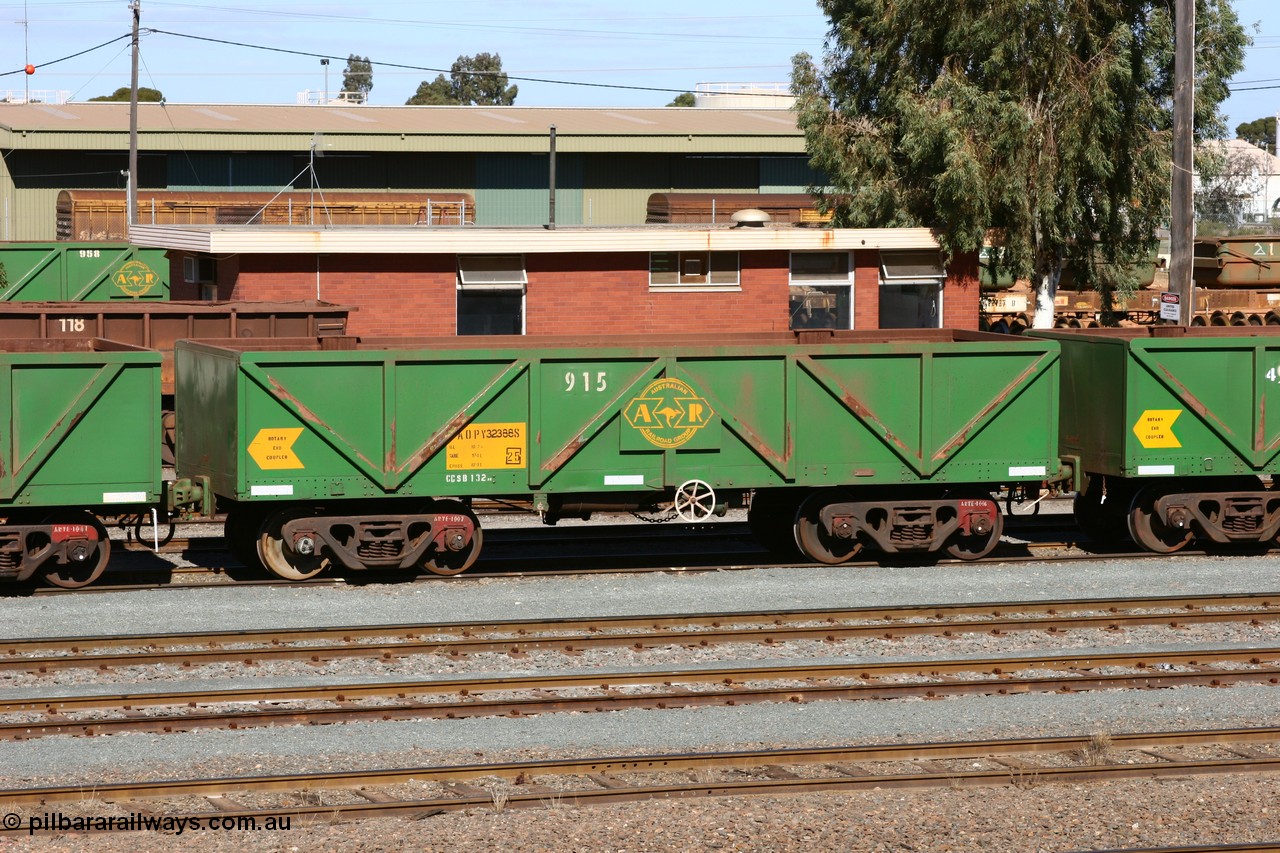 060528 4436
West Kalgoorlie, AOPY 32388, fleet number 915, one of seventy ex ANR coal waggons rebuilt from AOKF type by Bluebird Engineering SA in service with ARG on Koolyanobbing iron ore trains. They used to be three metres longer and originally built by Metropolitan Cammell Britain as GB type in 1952-55, 28th May 2006.
Keywords: AOPY-type;AOPY32388;Bluebird-Engineering-SA;Metropolitan-Cammell-Britain;GB-type;
