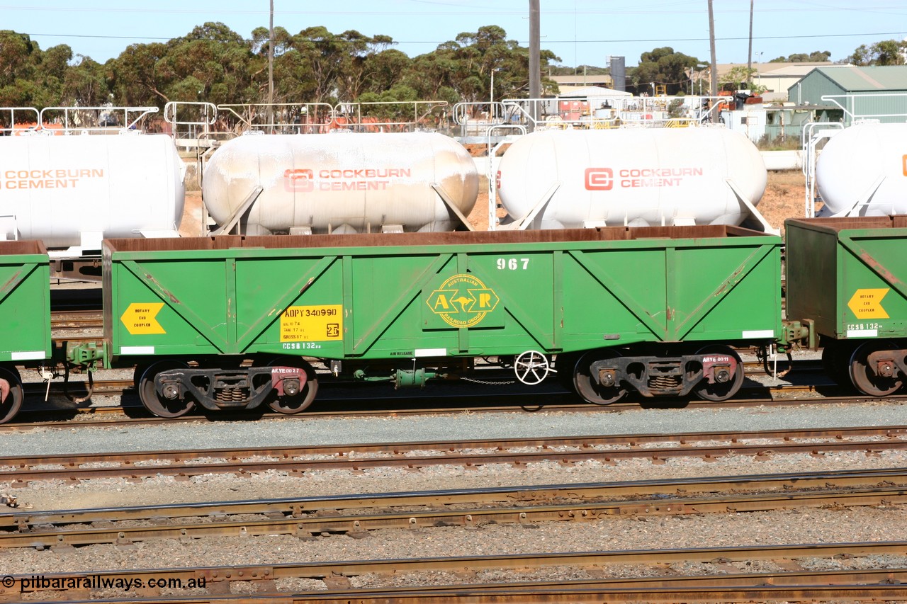 060528 4494
West Kalgoorlie, AOPY 34099, fleet number 967 and of the drop floor type, one of seventy ex ANR coal waggons rebuilt from AOKF type by Bluebird Engineering SA in service with ARG on Koolyanobbing iron ore trains. They used to be three metres longer and originally built by Metropolitan Cammell Britain as GB type in 1952-55, 28th May 2006.
Keywords: AOPY-type;AOPY34099;Bluebird-Engineering-SA;Metropolitan-Cammell-Britain;GB-type;
