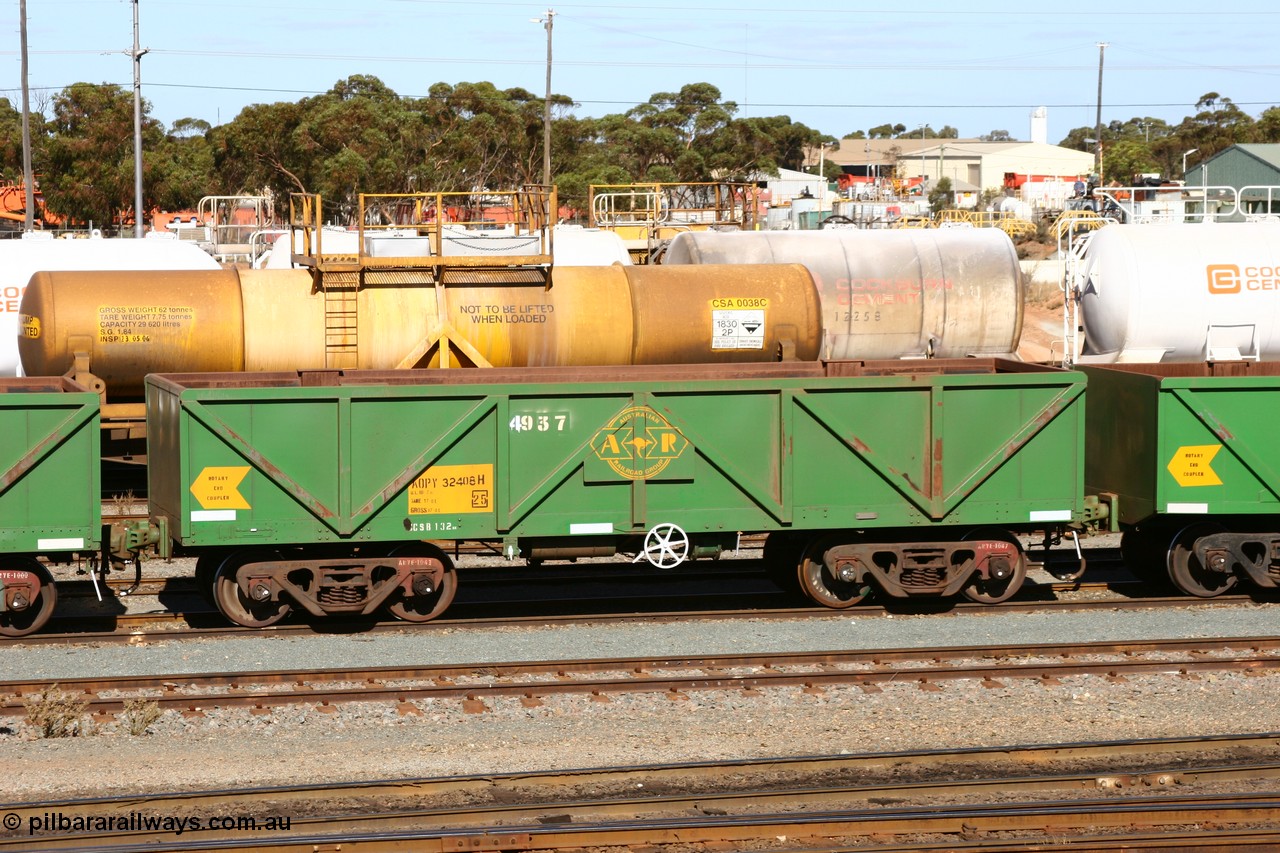 060528 4498
West Kalgoorlie, AOPY 32408, fleet number 4937, the 4 being a recent addition, is one of 70 ex ANR coal waggons rebuilt from AOKF and AOJFs by Bluebird Engineering, SA. Now in service with ARG on Koolyanobbing iron ore trains. They used to be longer by two panels. Prior they were GH's. West Kalgoorlie, 28th May 2006.
Keywords: AOPY-type;AOPY32408;Bluebird-Engineering-SA;Metropolitan-Cammell-Britain;GB-type;