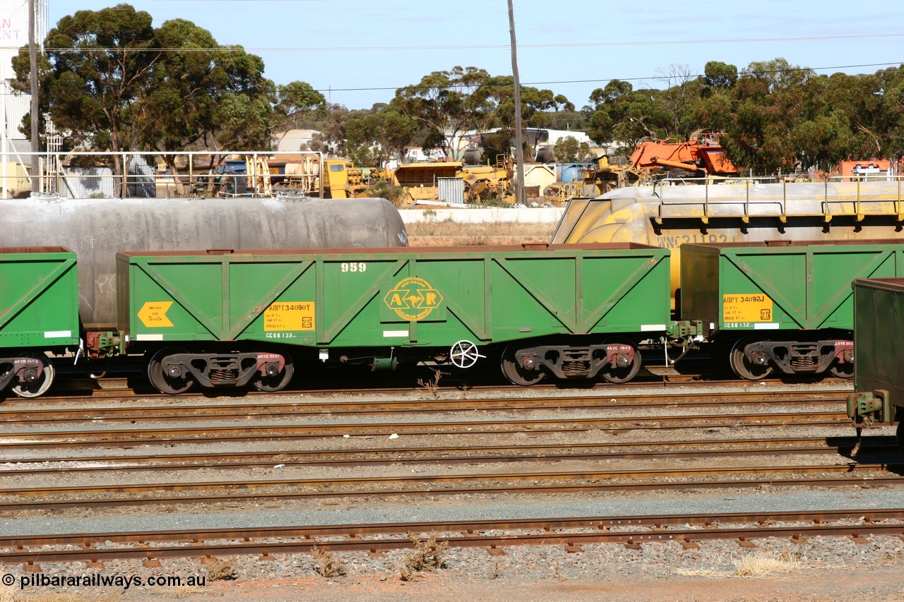 060528 4502
West Kalgoorlie, AOPY 34090 with fleet number 959 and of the drop floor type, one of seventy ex ANR coal waggons rebuilt from AOKF type by Bluebird Engineering SA in service with ARG on Koolyanobbing iron ore trains. They used to be three metres longer and originally built by Metropolitan Cammell Britain as GB type in 1952-55, 28th May 2006.
Keywords: AOPY-type;AOPY34090;Bluebird-Engineering-SA;Metropolitan-Cammell-Britain;GB-type;