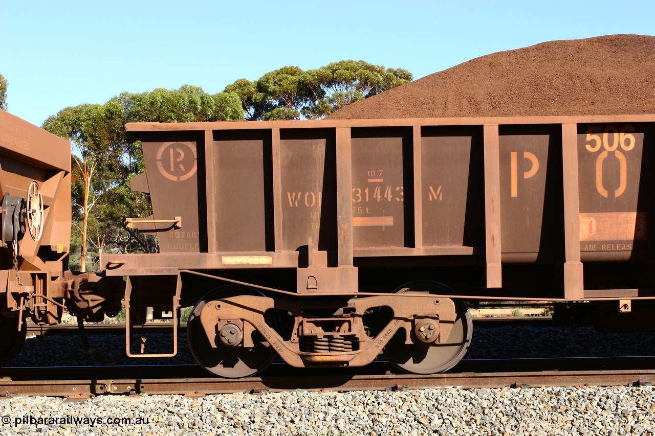 060528 4559
WOD type iron ore waggon WOD 31443 is one of a batch of sixty two built by Goninan WA between April and August 2000 with serial number 950086-016 and fleet number 506 for Koolyanobbing iron ore operations, build date 05/2000, with a 75 ton capacity, for Portman Mining to cart their Koolyanobbing iron ore to Esperance. Seen here loaded with fines in train 413 at Bonnie Vale. 28th May 2006.
Keywords: WOD-type;WOD31443;Goninan-WA;950086-016;
