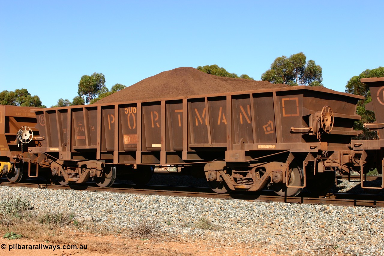 060528 4560
WOD type iron ore waggon WOD 31443 is one of a batch of sixty two built by Goninan WA between April and August 2000 with serial number 950086-016 and fleet number 506 for Koolyanobbing iron ore operations, build date 05/2000, with a 75 ton capacity, for Portman Mining to cart their Koolyanobbing iron ore to Esperance. Seen here loaded with fines in train 413 at Bonnie Vale. 28th May 2006.
Keywords: WOD-type;WOD31443;Goninan-WA;950086-015;