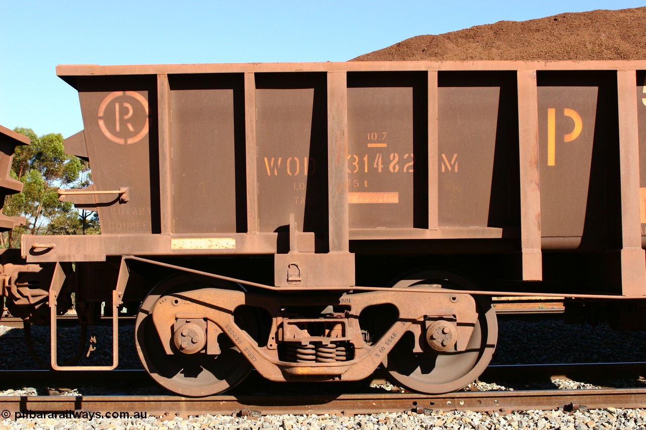 060528 4562
WOD type iron ore waggon WOD 31482 is one of a batch of sixty two built by Goninan WA between April and August 2000 with serial number 950086-054 and fleet number 545 for Koolyanobbing iron ore operations with a 75 ton capacity build date 07/2000, for Portman Mining to cart their Koolyanobbing iron ore to Esperance. Seen here loaded with fines in train 413 at Bonnie Vale. 28th May 2006.
Keywords: WOD-type;WOD31482;Goninan-WA;950086-054;