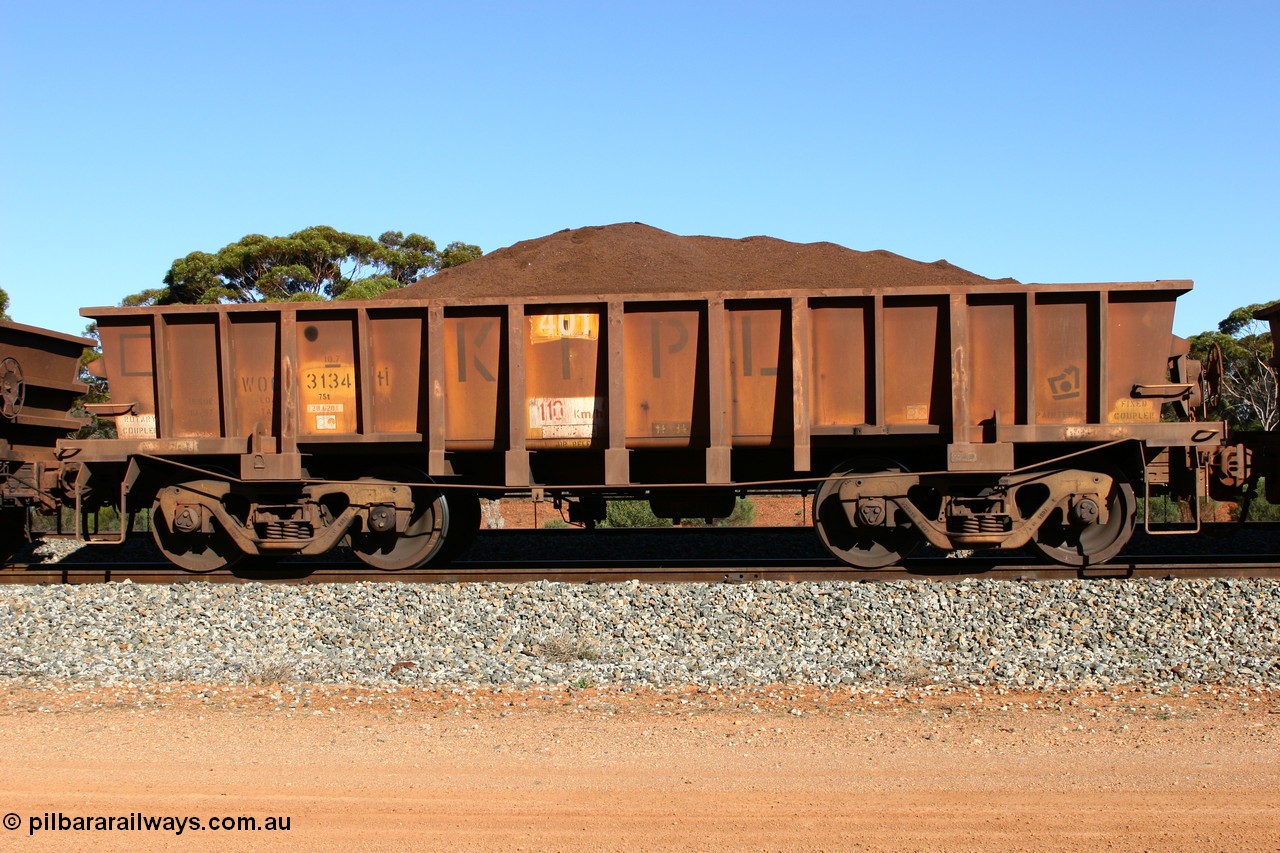 060528 4568
WOC type iron ore waggon WOC 31341 is leader of a batch of thirty built by Goninan WA between October 1997 to January 1998 with fleet number 401 for Koolyanobbing iron ore operations with a 75 ton capacity and lettered for KIPL, Koolyanobbing Iron Pty Ltd, seen here loaded with fines ore at Bonnie Vale in train number 413, 28th May 2006.
Keywords: WOC-type;WOC31341;Goninan-WA;