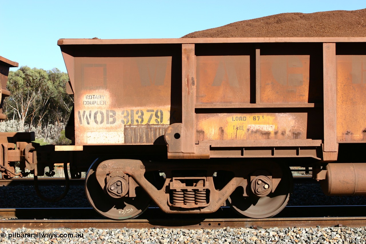 060528 4581
WOB type iron ore waggon WOB 31379 is one of a batch of twenty five built by Comeng WA between 1974 and 1975 and converted from Mt Newman high sided waggons by WAGR Midland Workshops with a capacity of 67 tons with fleet number 304 for Koolyanobbing iron ore operations, seen here at Bonnie Vale loaded with fines, 28th May 2006.
Keywords: WOB-type;WOB31379;Comeng-WA;Mt-Newman-Mining;