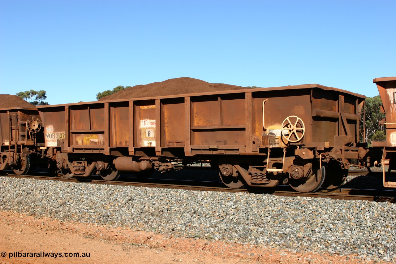 060528 4582
WOB type iron ore waggon WOB 31379 is one of a batch of twenty five built by Comeng WA between 1974 and 1975 and converted from Mt Newman high sided waggons by WAGR Midland Workshops with a capacity of 67 tons with fleet number 304 for Koolyanobbing iron ore operations, the WAGR and Comeng builders plates are visible in the waggon sill, seen here at Bonnie Vale loaded with fines, 28th May 2006.
Keywords: WOB-type;WOB31379;Comeng-WA;Mt-Newman-Mining;