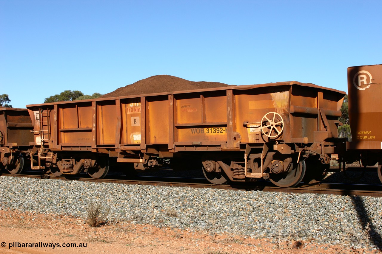 060528 4584
WOB type iron ore waggon WOB 31392 is one of a batch of twenty five built by Comeng WA between 1974 and 1975 and converted from Mt Newman high sided waggons by WAGR Midland Workshops with a capacity of 67 tons with fleet number 317 for Koolyanobbing iron ore operations, then the top section re-fitted and converted to a WSM ballast hopper, then converted back to a WOB by WAGR Midland Workshops. It was originally numbered 31391 by WAGR, seen here loaded with fines at Bonnie Vale, 28th May 2006.
Keywords: WOB-type;WOB31392;Comeng-WA;WSM-type;Mt-Newman-Mining;