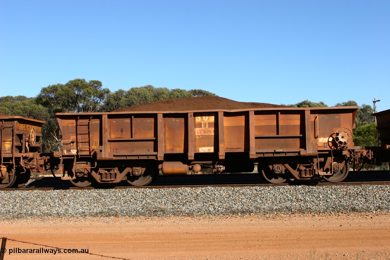 060528 4593
WOB type iron ore waggon WOB 31378 is one of a batch of twenty five built by Comeng WA between 1974 and 1975 and converted from Mt Newman high sided waggons by WAGR Midland Workshops with a capacity of 67 tons with fleet number 303 for Koolyanobbing iron ore operations, loaded with fines at Bonnie Vale, 28th May 2005.
Keywords: WOB-type;WOB31378;Comeng-WA;Mt-Newman-Mining;