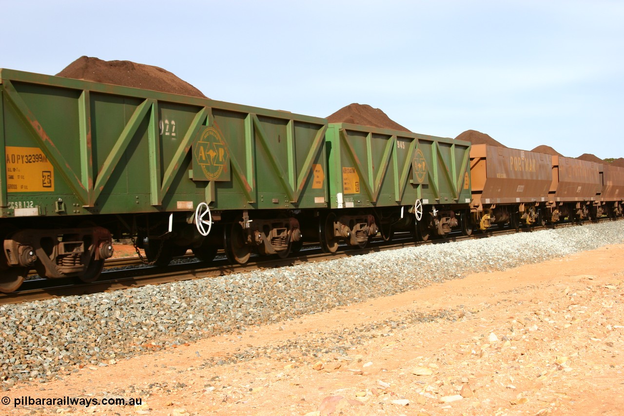 060531 5008
Binduli, AOPY 32399, fleet number 922, one of seventy ex ANR coal waggons rebuilt from AOKF type by Bluebird Engineering SA in service with ARG on Koolyanobbing iron ore trains. They used to be three metres longer and originally built by Metropolitan Cammell Britain as GB type in 1952-55, seen here in the consist with sister waggons of a loaded train bound for West Kalgoorlie, 31st May 2006.
Keywords: AOPY-type;AOPY32399;Bluebird-Engineering-SA;Metropolitan-Cammell-Britain;GB-type;