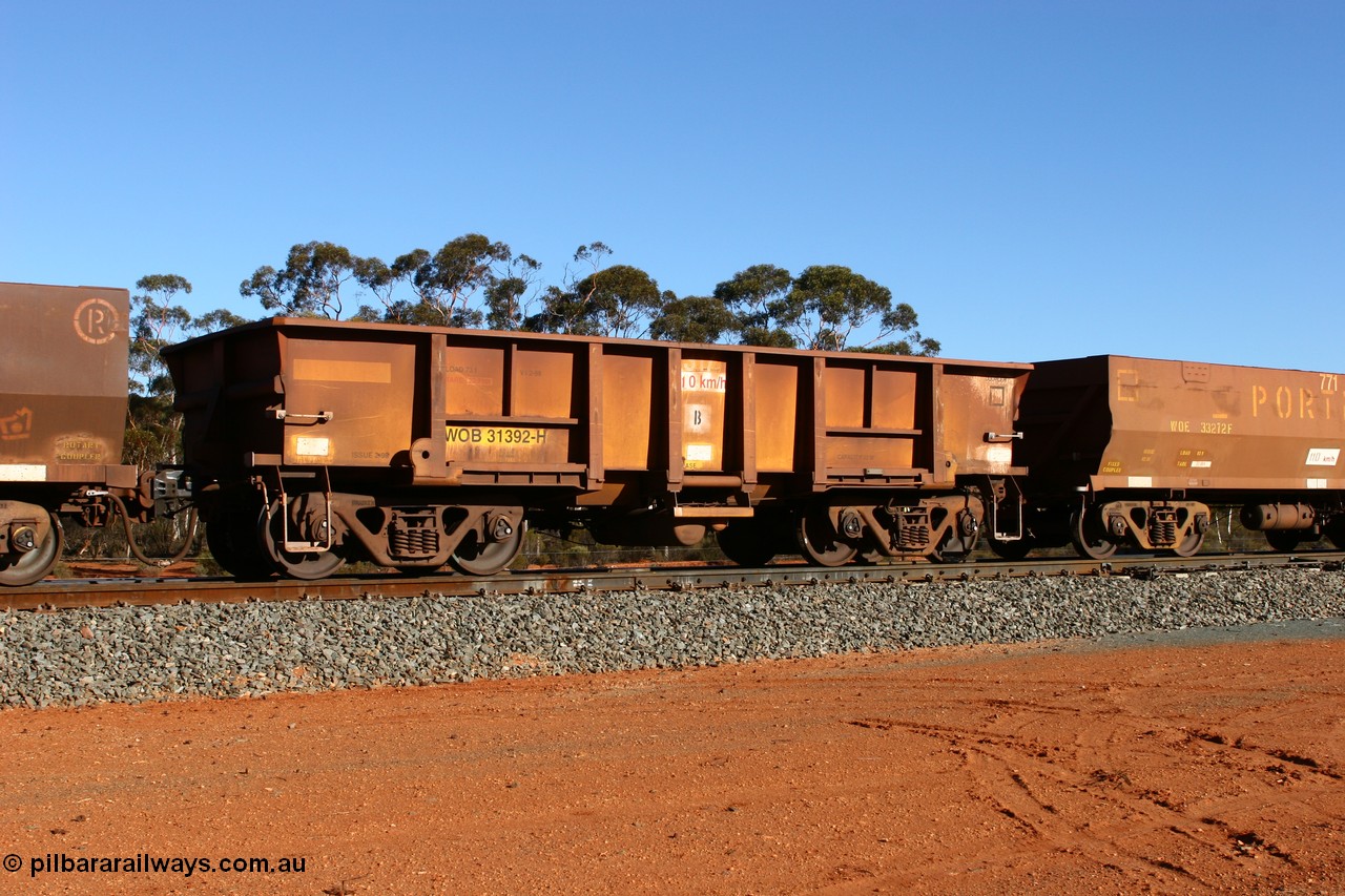 070531 9727
WOB type iron ore waggon WOB 31392 is one of a batch of twenty five built by Comeng WA between 1974 and 1975 and converted from Mt Newman high sided waggons by WAGR Midland Workshops with fleet number 317 for Koolyanobbing iron ore operations, shows the higher tare of these waggons and the capacity of 73 tons, waggon length of 10.8 metres, and a close inspection reveals that the round WAGR waggon builder's number is 31391 of 1974, this waggon cut down originally from a Comeng built Mt Newman Mining ore waggon in 1974. It was then converted to a WSM ballast hopper, then converted back to a WOB by WAGR Midland Workshops. It was originally numbered 31391 by WAGR, seen here at Binduli on an empty train, 31st May 2007.
Keywords: WOB-type;WOB31392;Comeng-WA;WSM-type;Mt-Newman-Mining;