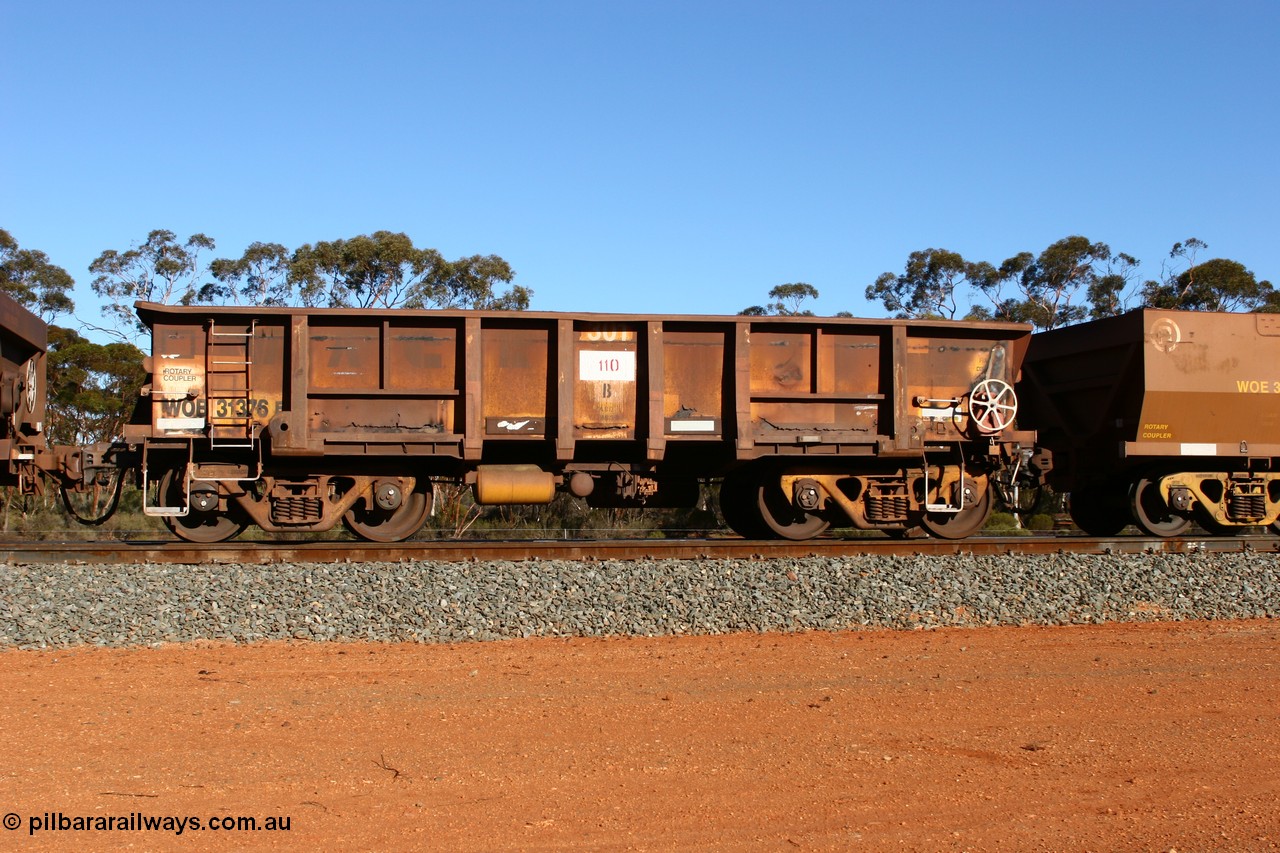 070531 9729
WOB type iron ore waggon WOB 31376 is leader of a batch of twenty five built by Comeng WA between 1974 and 1975 and converted from Mt Newman high sided waggons by WAGR Midland Workshops with a capacity of 67 tons with fleet number 301 for Koolyanobbing iron ore operations. In an empty train at Binduli, 31st May 2007.
Keywords: WOB-type;WOB31376;Comeng-WA;Mt-Newman-Mining;