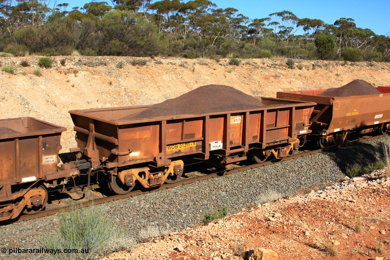100602 8546
WOB type iron ore waggon WOB 31399 is one of a batch of twenty five built by Comeng WA between 1974 and 1975 and converted from Mt Newman high sided waggons by WAGR Midland Workshops with a capacity of 67 tons with fleet number 323 for Koolyanobbing iron ore operations, seen here west of Binduli 2nd June 2010.
Keywords: WOB-type;WOB31399;Comeng-WA;WSM-type;Mt-Newman-Mining;