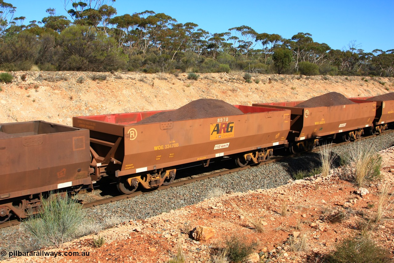 100602 8572
WOE type iron ore waggon WOE 33470 is one of a batch of one hundred and twenty eight built by United Group Rail WA between August 2008 and March 2009 with serial number 950211-012 and fleet number 8970 for Koolyanobbing iron ore operations, the 8 being a addition due to fleet size, build date of 06/2006 with a revised load of 82.5 tonnes, with PORTMAN painted out and an ARG decal applied to the side, seen here west of Binduli, 2nd June 2010.
Keywords: WOE-type;WOE33470;United-Group-Rail-WA;950211-012;