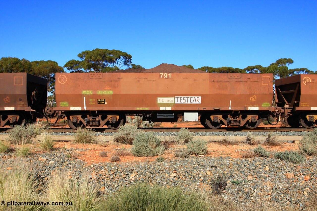 100602 8590
WOE type iron ore waggon WOE 33292 is one of a batch of thirty five built by United Goninan WA between January and April 2005 with serial number 950104-032 and fleet number 791 for Koolyanobbing iron ore operations, set up as a test car, build date of 04/2005 with a revised load of 82.5 tonnes and PORTMAN painted out, seen here at of Binduli, 2nd June 2010.
Keywords: WOE-type;WOE33292;test-car;United-Goninan-WA;950104-032;