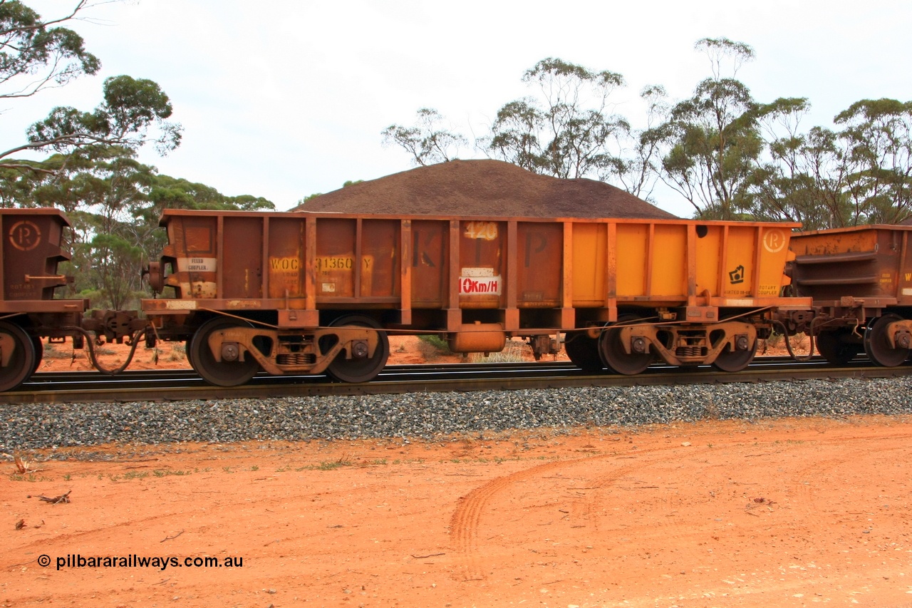 100605 9334
WOC type iron ore waggon WOC 31360 is one of a batch of thirty built by Goninan WA between October 1997 to January 1998 with fleet number 420 for Koolyanobbing iron ore operations with a 75 ton capacity and lettered for KIPL, Koolyanobbing Iron Pty Ltd, with the non-handbrake end repainted, seen here loaded with fines ore, Binduli, 5th June 2010.
Keywords: WOC-type;WOC31360;Goninan-WA;