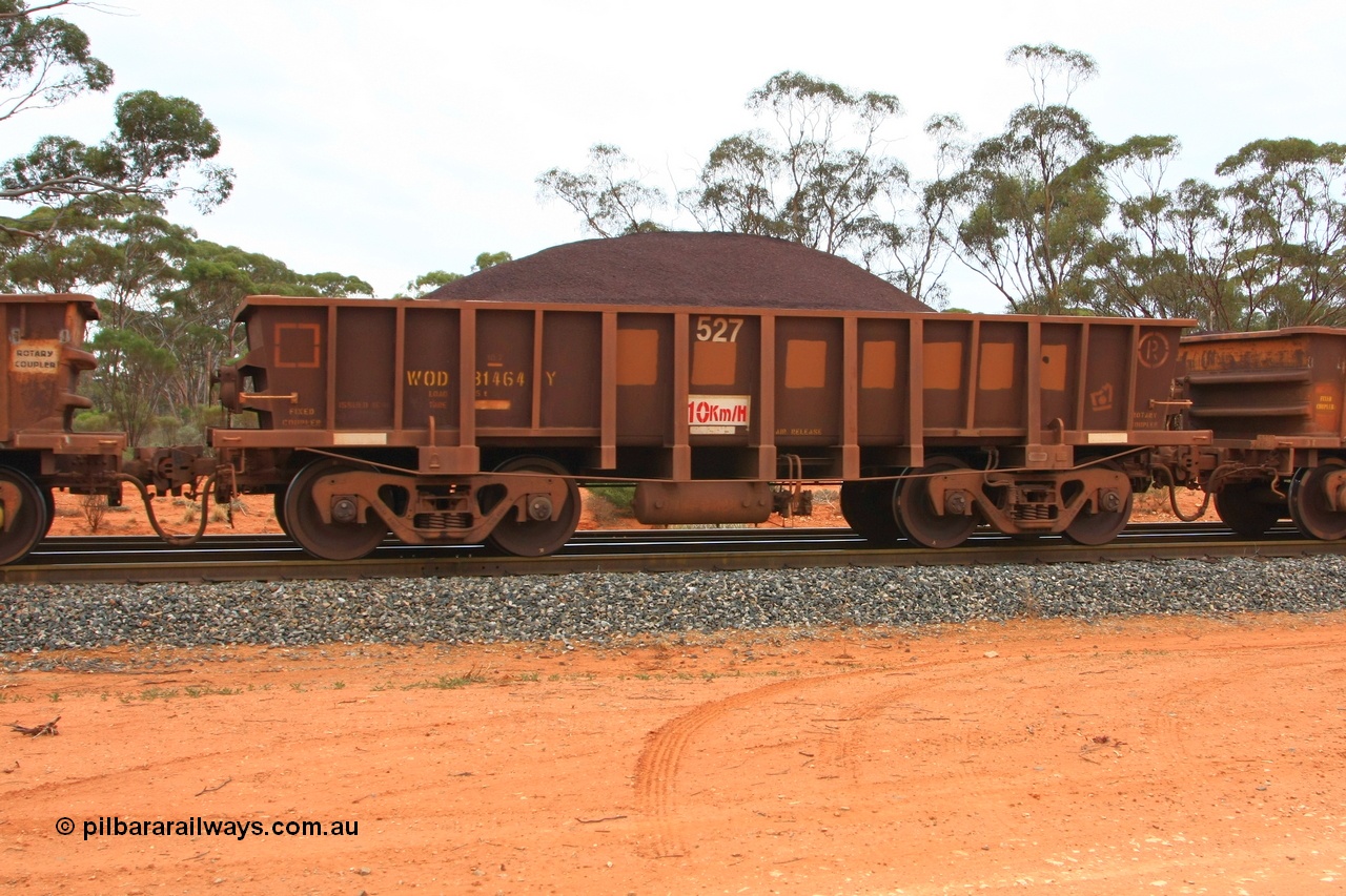 100605 9342
WOD type iron ore waggon WOD 31464 is one of a batch of sixty two built by Goninan WA between April and August 2000 with serial number 950086-036 and fleet number 527 for Koolyanobbing iron ore operations with a 75 ton capacity for Portman Mining to cart their Koolyanobbing iron ore to Esperance, now with PORTMAN painted out, Binduli Triangle, loaded with fines, 5th June 2010.
Keywords: WOD-type;WOD31464;Goninan-WA;950086-036;