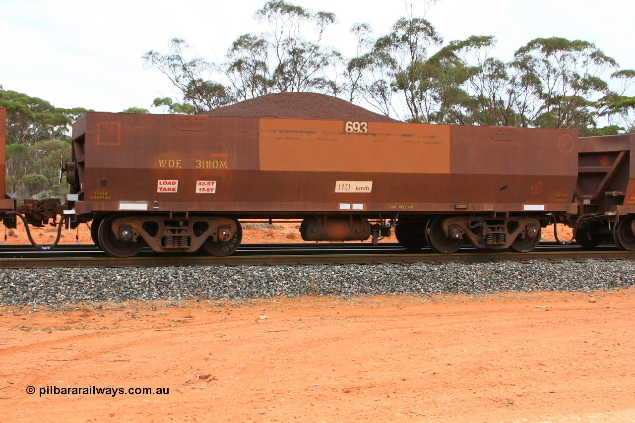 100605 9357
WOE type iron ore waggon WOE 31110 is one of a batch of one hundred and thirty built by Goninan WA between March and August 2001 with serial number 950092-100 and fleet number 693 for Koolyanobbing iron ore operations, seen here Binduli Triangle 5th June 2010.
Keywords: WOE-type;WOE31110;Goninan-WA;950092-100;