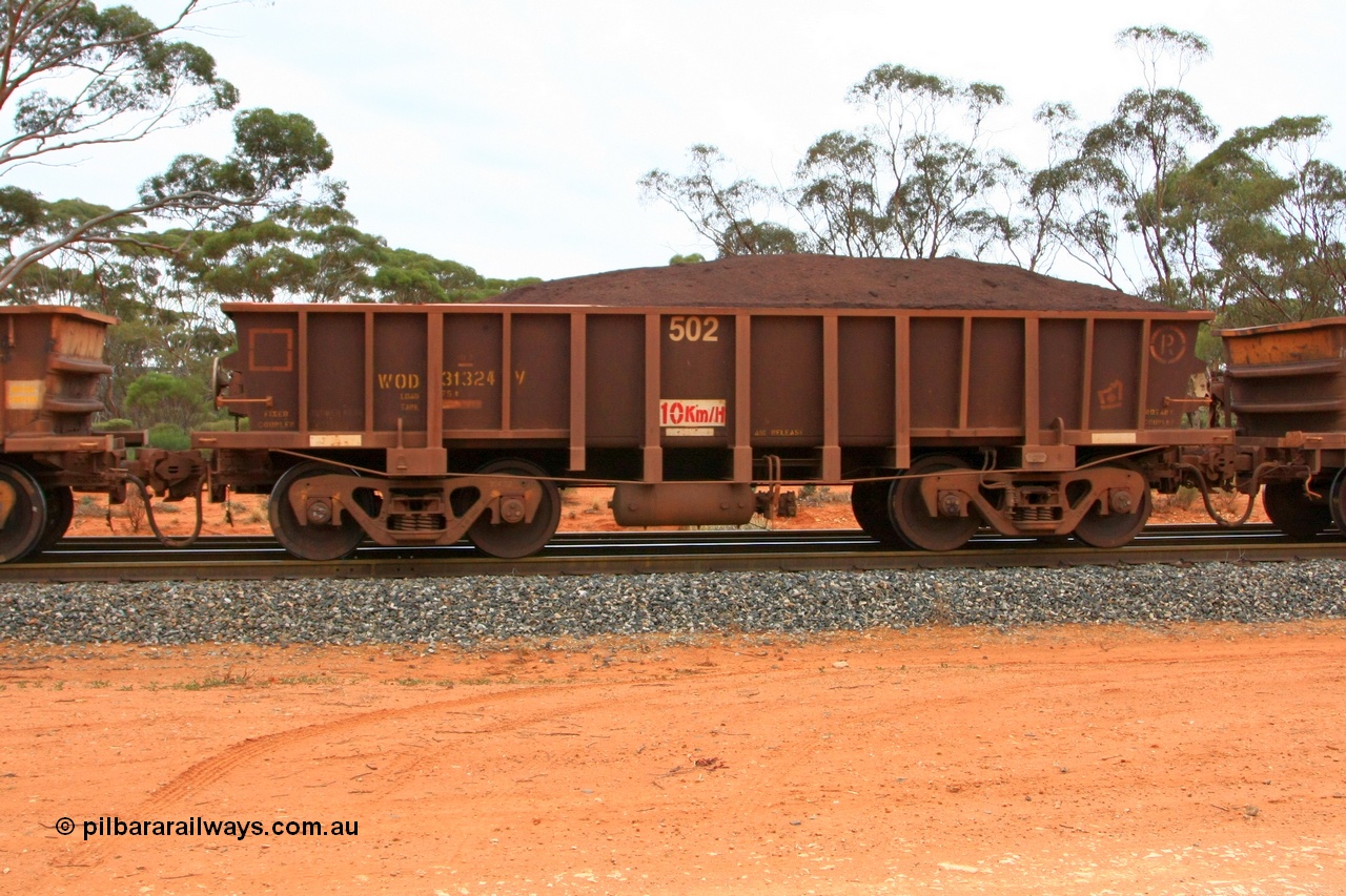 100605 9374
WOD type iron ore waggon WOD 31324 is one of a batch of sixty two built by Goninan WA between April and August 2000 with serial number 950086-012 and fleet number 502 for Koolyanobbing iron ore operations with a 75 ton capacity and a replacement for a WO type waggon number, for Portman Mining to cart their Koolyanobbing iron ore to Esperance, Binduli Triangle, loaded with fines, 5th June 2010.
Keywords: WOD-type;WOD31324;Goninan-WA;950086-012;