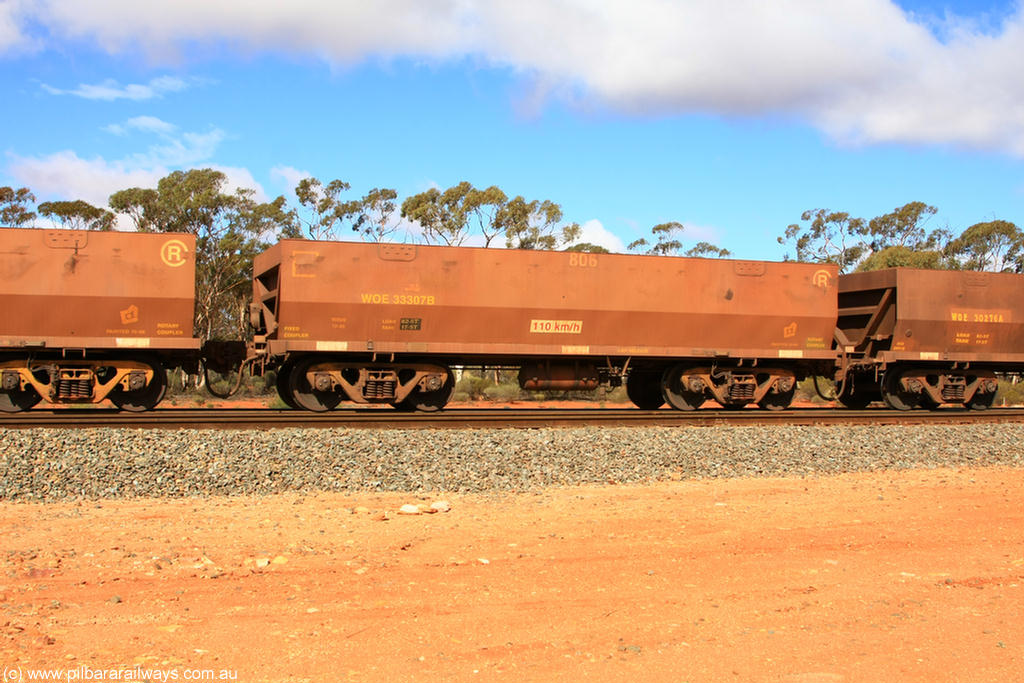 100729 01485
WOE type iron ore waggon WOE 33307 is one of a batch of one hundred and forty one built by United Goninan WA between November 2005 and April 2006 with serial number 950142-012 and fleet number 806 for Koolyanobbing iron ore operations with the revised down load of 82.5 tonnes, in a loaded train at Binduli 27th July 2010.
Keywords: WOE-type;WOE33307;United-Goninan-WA;950142-012;