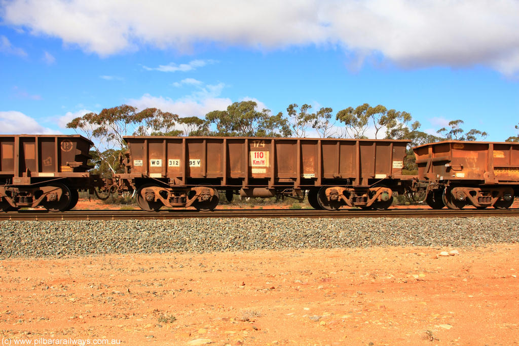 100729 01491
WO type iron ore waggon WO 31295 is one of a batch of fifteen built by WAGR Midland Workshops between July and October 1968 with fleet number 174 for Koolyanobbing iron ore operations, with a 75 ton and 1018 ft³ capacity, Binduli Triangle, empty train 29th July 2010. This unit was converted to WOC for coal in 1986 till 1994 when it was re-classed back to WO.
Keywords: WO-type;WO31295;WAGR-Midland-WS;