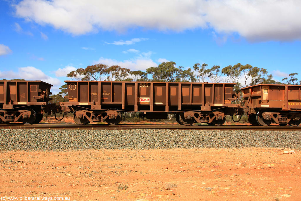 100729 01505
WOD type iron ore waggon WOD 31462 is one of a batch of sixty two built by Goninan WA between April and August 2000 with serial number 950086-034 and fleet number 525 for Koolyanobbing iron ore operations with a 75 ton capacity for Portman Mining to cart their Koolyanobbing iron ore to Esperance, now with PORTMAN painted out, Binduli Triangle, 29th July 2010.
Keywords: WOD-type;WOD31462;Goninan-WA;950086-034;