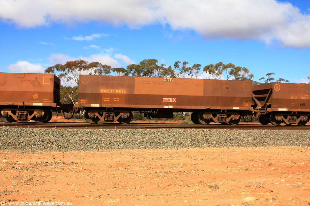 100729 01517
WOE type iron ore waggon WOE 31091 is one of a batch of one hundred and thirty built by Goninan WA between March and August 2001 with serial number 950092-081 and fleet number 676 for Koolyanobbing iron ore operations, at Binduli Triangle, 29th July 2010.
Keywords: WOE-type;WOE31091;Goninan-WA;950092-081;